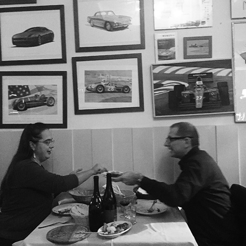 A couple eating dinner in Il Fantino restaurant, Modena, Italy