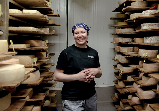 A cheesemaker in the dairy at Oviken Ost Sweden